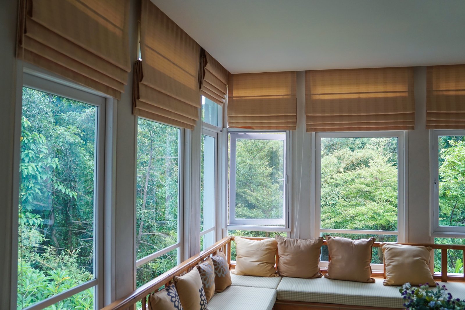 Inspired Roman Shades Covering Windows